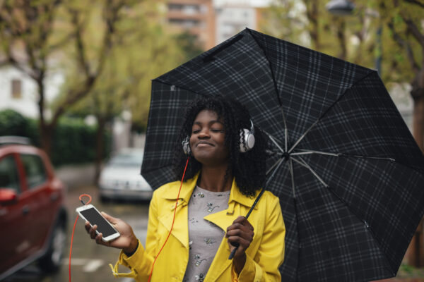Girl with Umbrella | Insurance Broker | MiSure